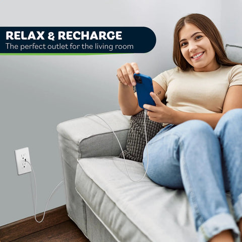 Woman relaxing on sofa using USB Outlet With Type A And Type C USB Ports, 5.8A Total Output, 15 Amp Tamper-Resistant Receptacle