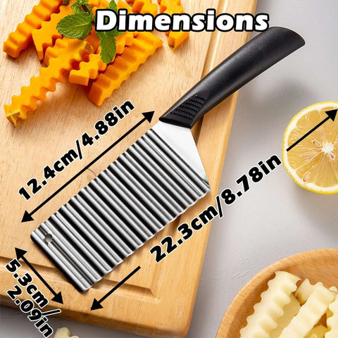 Front view of crinkle-cut veggie knife with ribbed stainless blade and black handle; 12.4 cm blade, 22.3 cm overall.