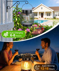 Metal Outdoor Solar Lanterns 2 Pack Waterproof Hanging Lights for yard with glowing lantern and couple dining at night