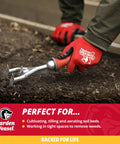 Double Sided Garden Cultivator And Tiller For Simple Soil Aeration And Tillage being used to till soil by a person wearing gloves