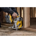 Badass Cordless Circular Saw Featuring Brushless Motor And 7-1/4 Inch Blade Pushing 5500 Rpm in action cutting through lumber.
