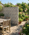 Garden scene with windmill breeze brick concrete molds and forms for wall decoration DIY cement furniture, reusable concrete molds in use.