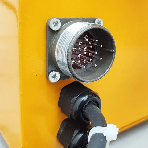 Breveltion portable hole drilling machine circular multipin connector mounted on orange equipment panel