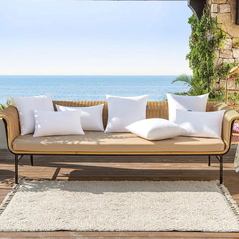 Pack Of 2 18x18 Outdoor Pillow Inserts, Waterproof And Water-Resistant Cushions on patio sofa overlooking ocean view