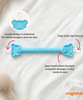 Blue baby nose cleaner and ear wax removal tool with bear head safe guard on white background