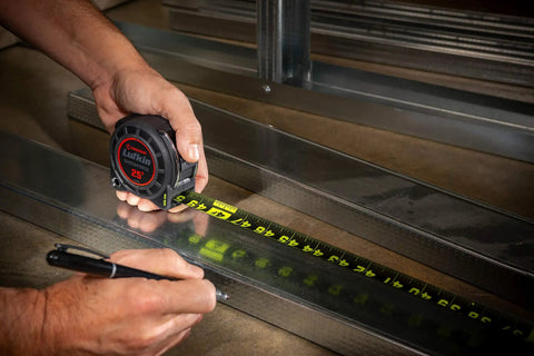 Person using Multicolor Home Measuring And Layout Tape Set For DIY Projects, Durable Steel Tape for quick measurements on metal surface