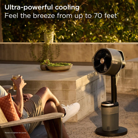 FlexBreeze Pro Mist Fan Indoor Outdoor Chill Machine in charcoal grey on patio, oscillating for 70 ft cooling reach