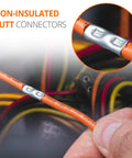 Close-up of Non-Insulated Butt Connectors Kit 100 Pcs For 24-8 AWG Cu Wire Splice in use with orange wire