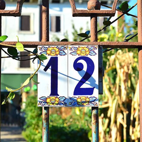Ceramic tile number 12 on a garden gate, colorful detail for the 12 Inch Big Ol Number Stencils Set, Reusable Plastic Large Size Number Stencils