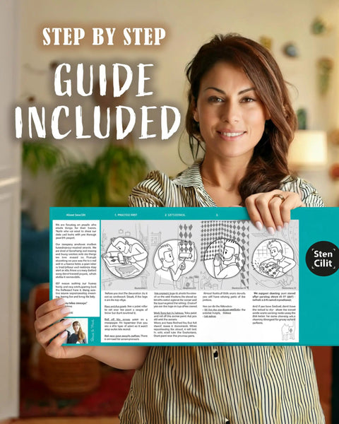 Woman holding instruction guide for Fern Wall Stencil Set 2 Pack 17 By 22.5 Inches For Painting Large Patterns Perfect DIY Wallpaper Alternative