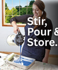 Woman using Gallon Paint Can Pour Spout Lid with Pistol Grip for mess-free stir, pour, and store, showcasing spill-free paint pouring.