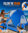 Woman setting up Portable Beach Sun Shelter For 2 To 8 People, UPF 50 Plus UV Protection, Easy Setup Waterproof Shade Canopy