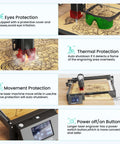 LONGER Ray5 5W laser engraver on 400x400mm bed with 3.5-inch touchscreen; safety features shown.