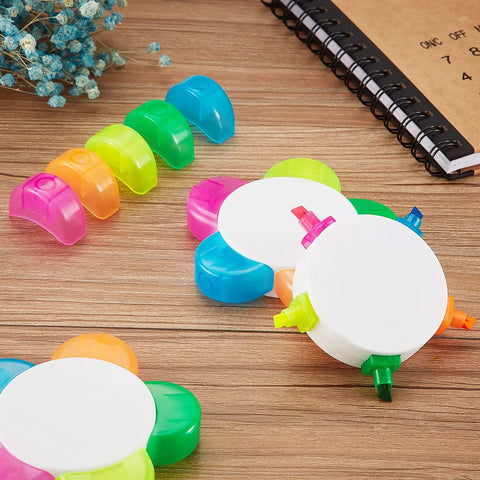 Three Piece Flower Petal Highlighters Set In Five Colors 5 In 1 Watercolor Fluorescent Pens on a desk with notebook and flowers