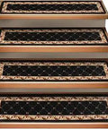Set Of 15 Attachable Indoor Carpet Stair Treads With Traditional Trellis Lattice And Floral Border In Ebony Black 9x36 Inches Non Slip For Wood Or Tile Stairs showing four treads installed.