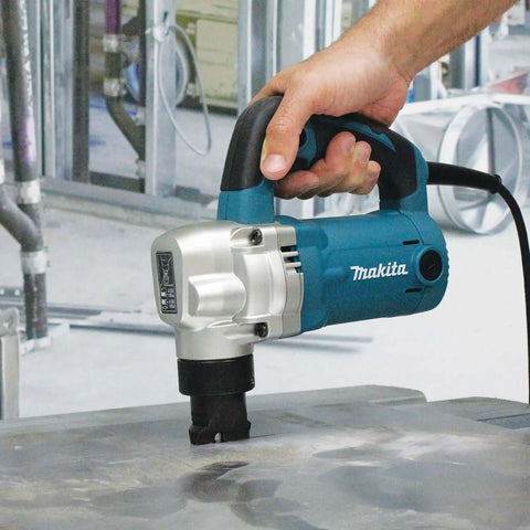 Person using Low Noise 10 Gauge Metal Nibbler with Lock On Trigger, lightweight 7.4 lb body, rubber grip handle for metal cutting
