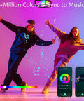 People dancing under 11 Inch WiFi Smart LED Flush Mount Light with color changing feature shown on mobile app screen.