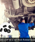 Mechanic using the All In One Rubber Spacer Set With 1 Inch Outer Diameter, 3/8 Inch Inner Diameter, 1/2 Inch Thick Black Round Washers For Anti Vibration, Mounting Bushings, Automotive And Home Gear, 8 Piece Pack under a car