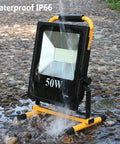 Spot Lighting 50W Led Rechargeable Construction Floodlight, 5000Lm Sup,，with IP66 waterproof feature in action under water.