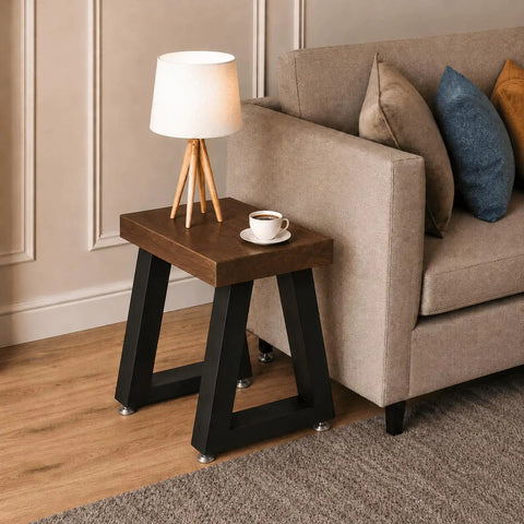 Small side table with 16 Inch Trapezoid Metal Table Legs Set Of 2 Beefy, Heavy Duty Black DIY Furniture Feet next to a sofa