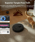 roborock Qrevo Series robot vacuum and mop, black, top-down view on rug with cat nearby
