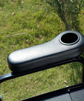 Golf Cart Rear Seat Arm Rest Kit With Cup Holder Black Universal Fit For EZGO Club Car And Yamaha Drilling Required Or No Drilling Easy Install Durable Plastic Base Plate For Long Lasting Use shown outdoors