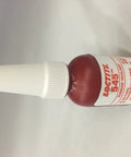 Close-up of Heavy Duty Thread Sealant For Pneumatic And Hydraulic Fittings 10 Milliliters Keeps Leaks Out, Prevents Loosening, Smooth Install Or Removal, Easy On Close Fitting Metal Surfaces Made In USA bottle