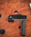 Desktop Quick Acting Holdfast Clamp Woodworking Bench Station With Hella Strong Grip Three Gear Locking System Router Hold Down Clip Solid Heavy Duty Build 20mm detail showing the black clamp on wood surface