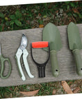 Garden tools on bench with Two Pack D Shaped Shovel Handle Grips Replacement For Garden Tools, Comfortable Non Slip Handles.