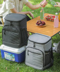 Kickass Heavy Duty Insulated Cooler Backpack With Leakproof Thermal Core And Adjustable Padded Straps For Camping Beach Hiking Keeps Snacks Ice Cold No Sweat, placed beside cooler, vibrant picnic setup.