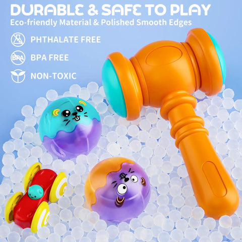 Plastic toy hammer with light-up balls and mini car from Two In One Rolling Ball And Car Ramp Race Track For Toddlers With Sensor Lights.