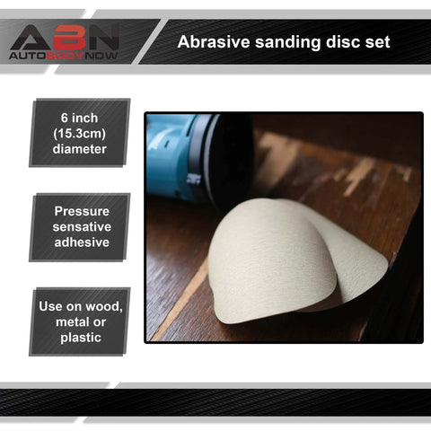 80 Grit Pro Grade Quick Change Sanding Discs Roll 6 Inch Round Aluminum Oxide Sticky Back Sandpaper on wood surface