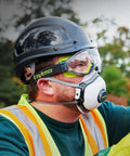Worker wearing Over Glasses Safety Goggles That Go Over Your Specs Clear Vision With Permanent Anti Fog Coating outdoors