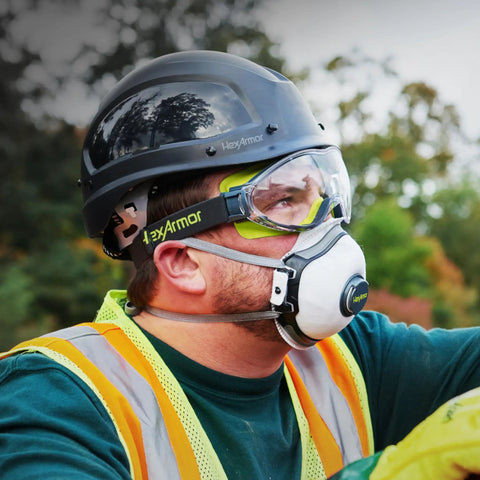 Worker wearing Over Glasses Safety Goggles That Go Over Your Specs Clear Vision With Permanent Anti Fog Coating outdoors
