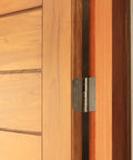 Built Thick Steel Interior Door Hinges Four Inch Antique Brass Finish Three Pack With Removable Pin For Smooth Daily Swinging And No Hassle Residential Installation on a stylish wooden door.