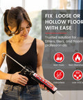 Person holding Fix-A-Floor Loose Tile Repair Adhesive with custom tip, 10.1 oz cartridge, for tile, porcelain, ceramic, marble, stone, wood floors.