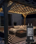 Outdoor Fairy Net Lights 270 LED Chandelier for Gazebo and Pergola illuminating seating area at night.
