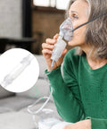 Oxygen tubing swivel connector (white) with mask tubing; side view of patient using an oxygen mask