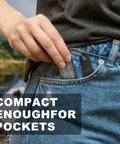 Person placing Hardcore Fire Starter Survival Kit With Magnesium Waterproof Matches And Ferro Rod Outdoor Firesteel Gear into jeans pocket