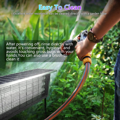 Person cleaning Boss Level Solar Bug Zapper Outdoor For Up To 4000 Sq Ft with garden hose in a green garden setting