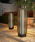 Outdoor Solar Powered Floor Lamp With Weatherproof Wicker Lantern For Garden Or Porch Large Patio Lamp illuminated on outdoors