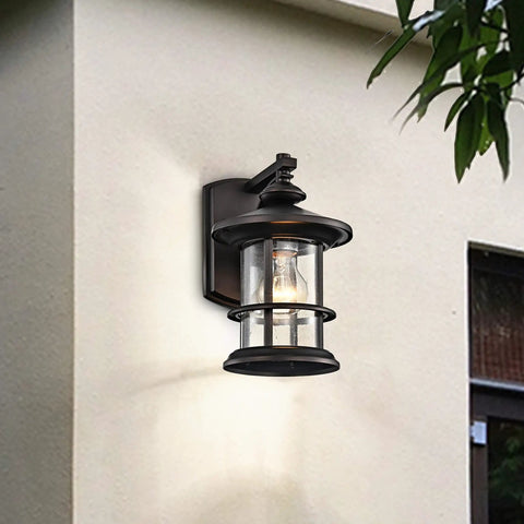 100W Max Vintage Farmhouse Outdoor Wall Light with Oil Rubbed Bronze Finish mounted on exterior wall, showing seedy glass