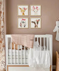 Framed Woodland Nursery Wall Decor 10x10 Inch Cute Baby Wall Art For Kids, 4 animal prints above a crib in a safari theme room.