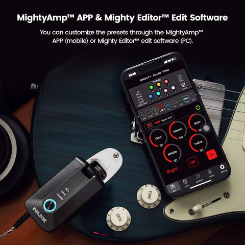 Mighty Plug Pro MP3 Guitar And Bass Headphone Amp with app interface on guitar
