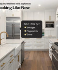 Modern kitchen with stainless steel appliances, white cabinets, and wood flooring, highlighting clean surfaces free from smudges and grime.