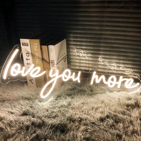 Neon Sign In Transparent Acrylic, Dimmable LED Wall Light That Turns Any Room Into A Cozy Vibe on plush carpet, warm white glow