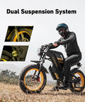Rider on 2000W Fat Tire Electric Bike With Removable 48V 25Ah Battery Full Suspension And Dual Hydraulic Brakes 32 MPH Max Speed 20 Inch