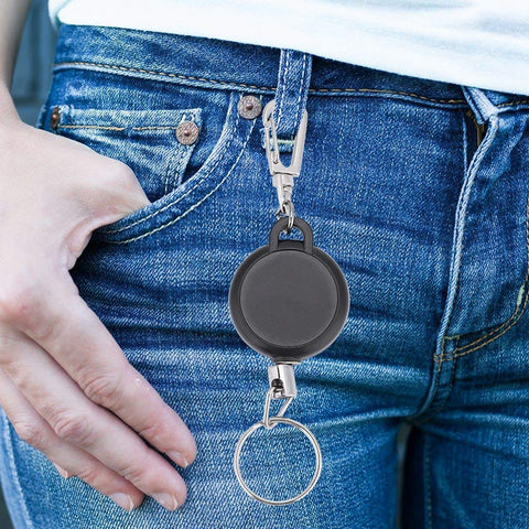 Extendable Keychain With Retractable Cord, 60cm Steel Wire Rope Key Reel attached to jeans; ABS plastic and stainless steel key ring.