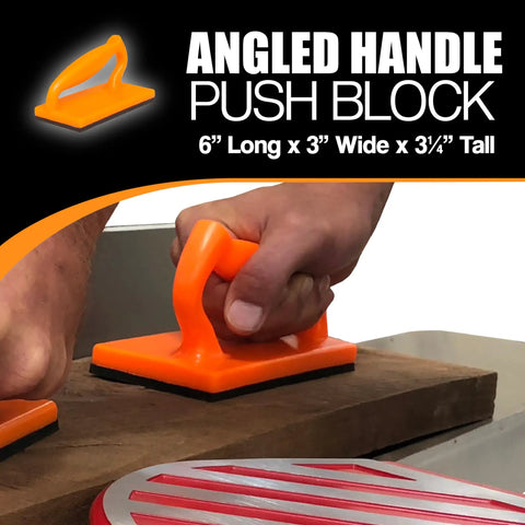 Close-up of orange angled handle push block being used on a wood surface from the Five Piece Woodworking Push Block And Push Stick Set In Safety Orange For Table Saws Router Tables Jointer And Band Saw Keeps Your Fingers Safe While You Push Through Cuts And Tackle Any Workshop Job.
