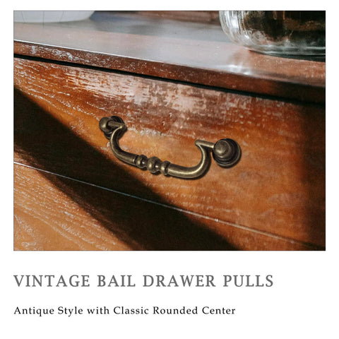 Vintage Drop Bail Drawer Pulls Set In Antique Brass 6 Pack For Furniture Restoration And Dresser Updates installed on drawer